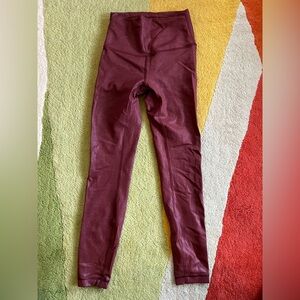 Lululemon Wunder Train High-Rise 25" Foil leggings in the color Red Merlot